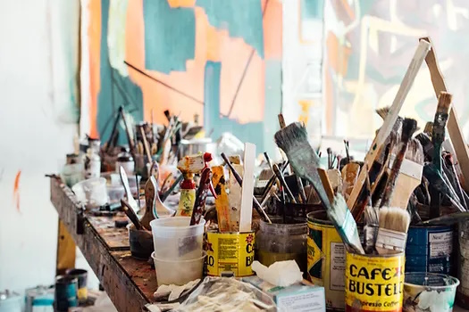 Photo of a table with paintbrushes