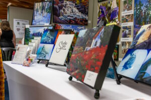 BCC Festival of the Arts - Art sitting on stands on a table being displayed